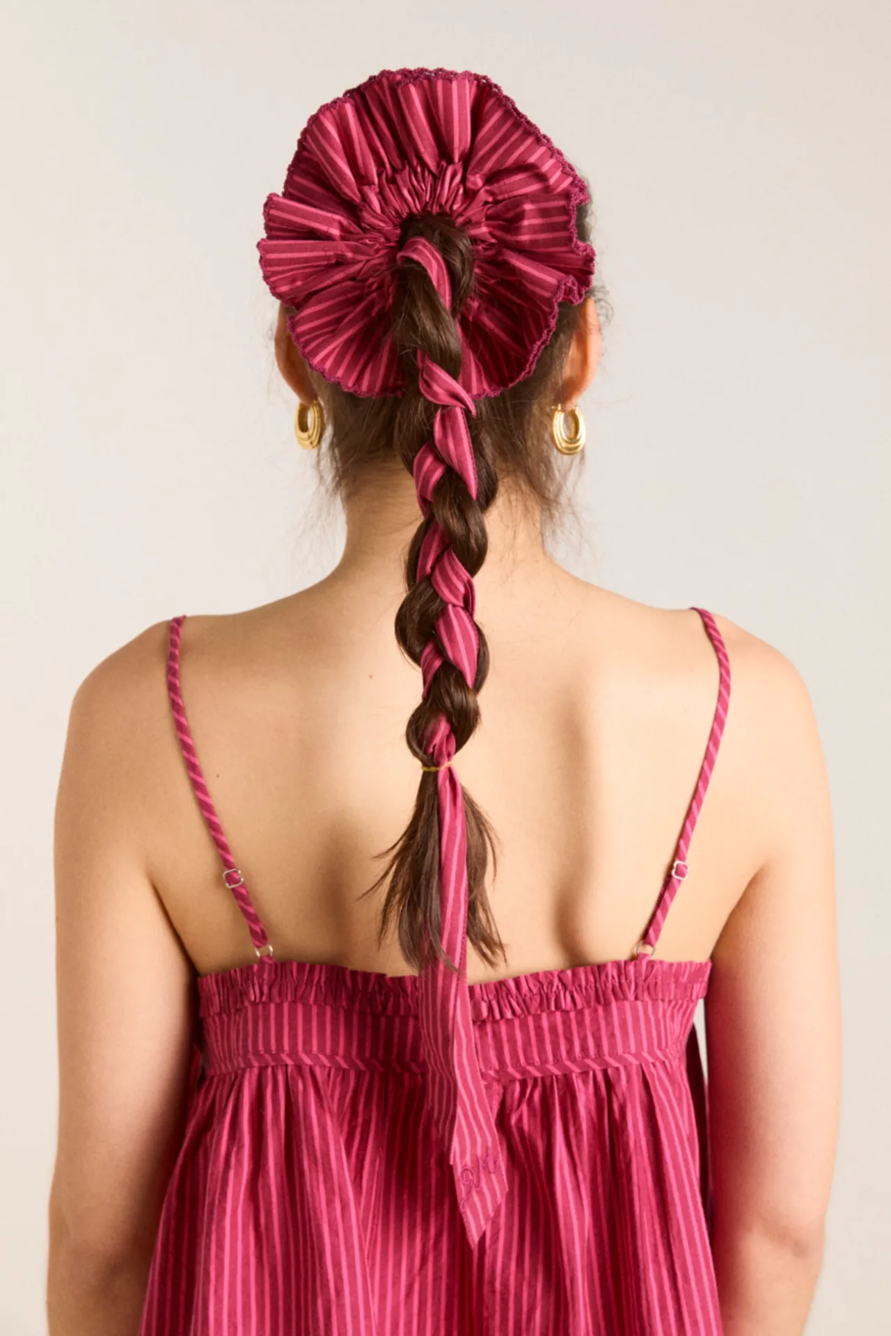 garter bun wrap in berry business stripe sold by Damson Madder