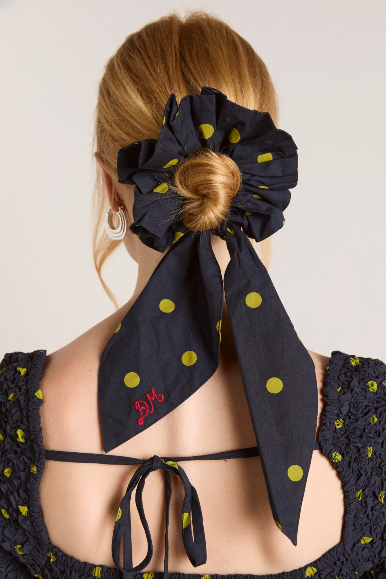 tie detail scrunchie in navy & olive spot sold by Damson Madder