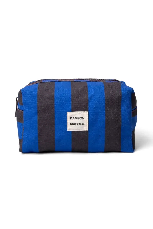 canvas make up bag- blue/grey stripe sold by Damson Madder