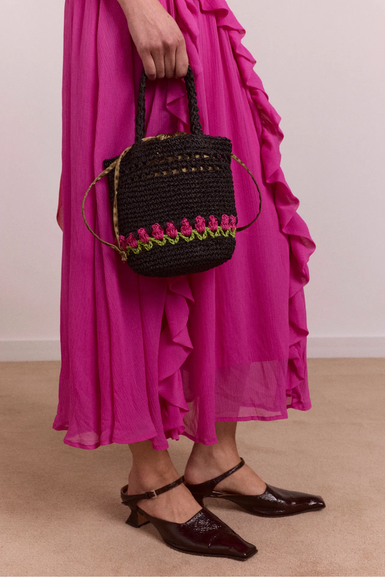 raffia tulip bag sold by Damson Madder