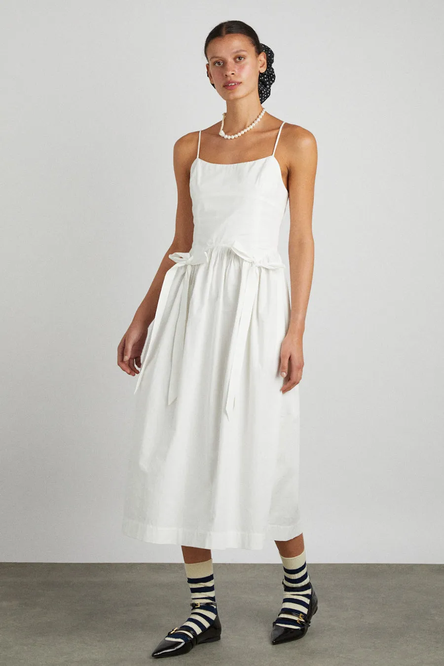 penelope apron dress - white sold by Damson Madder