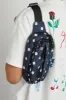 printed spot frill front cross body bag sold by Damson Madder