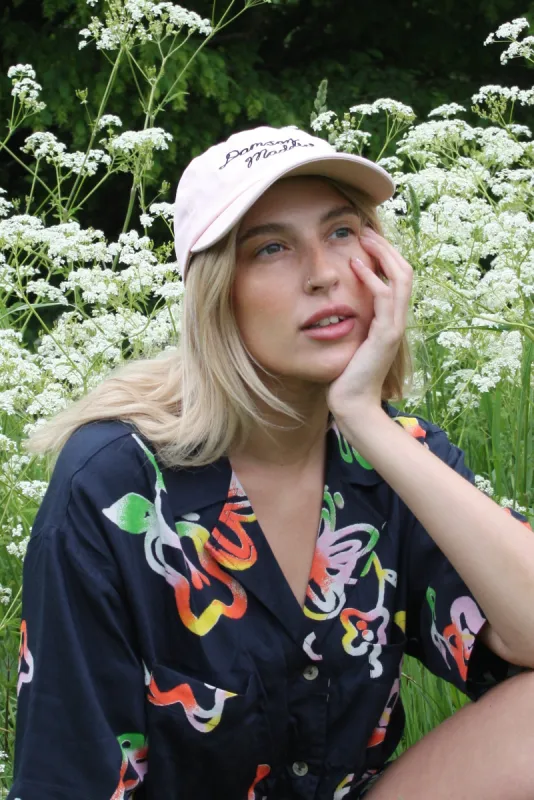 pink embroidered cap sold by Damson Madder
