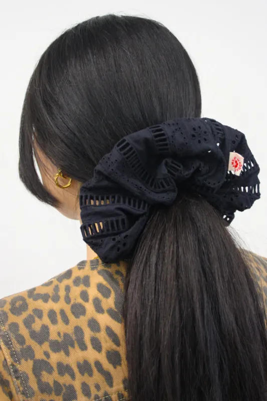 oversized broderie scrunchie in black sold by Damson Madder