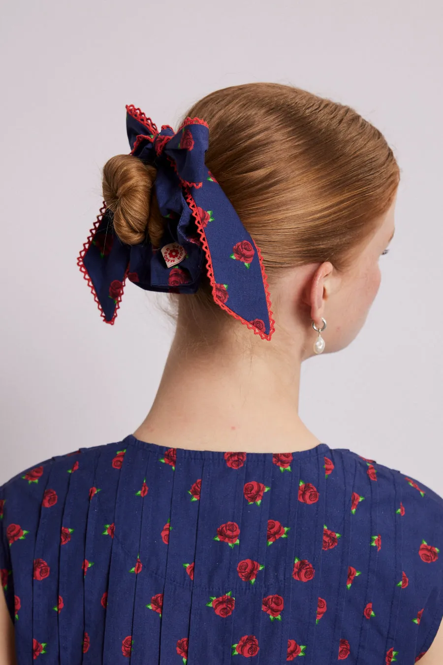 bow scrunchie in rose print sold by Damson Madder