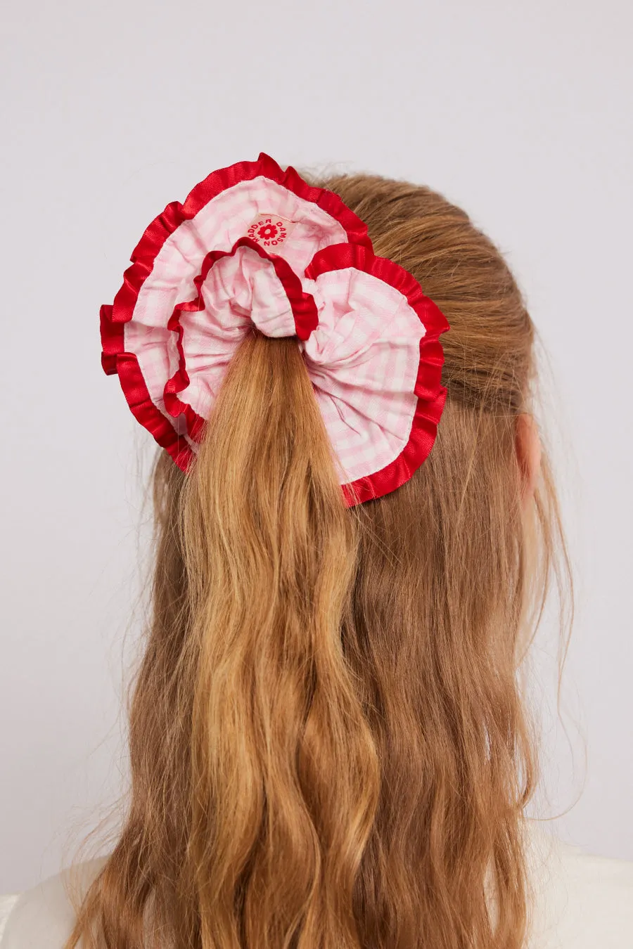 frill scrunchie in pink gingham with satin edge sold by Damson Madder
