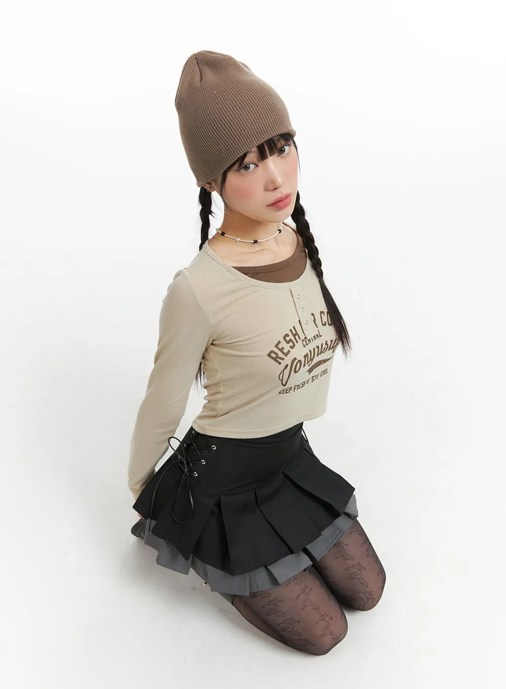 Fake Two-Piece Graphic Lettering Crop Long Sleeve Top IJ411 sold by Lewkin