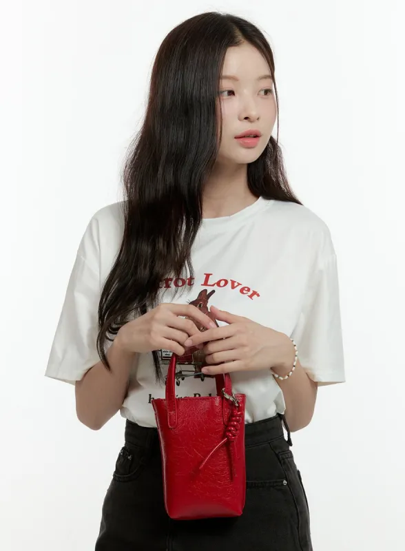 Twisted Charm Mini Faux Leather Bag OL430 sold by Lewkin