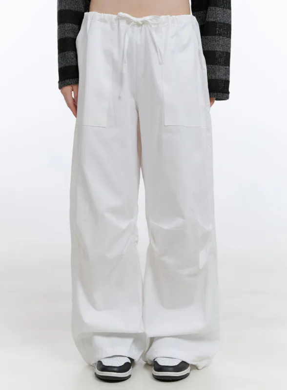String Pocket Low-Rise Wide Leg Pants CG412 sold by Lewkin