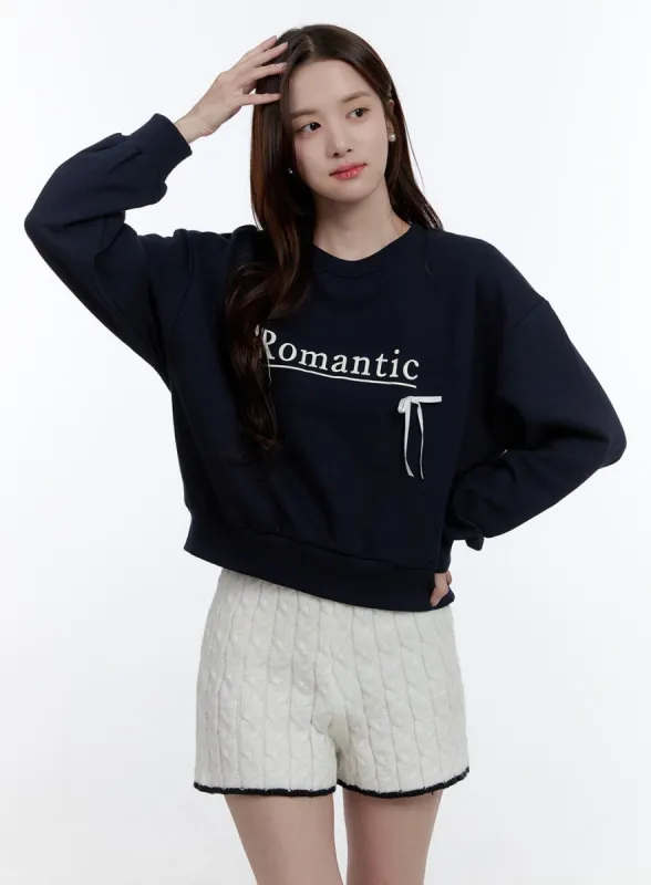 Cozy Ribbon Lettering Sweatshirt OO407 sold by Lewkin