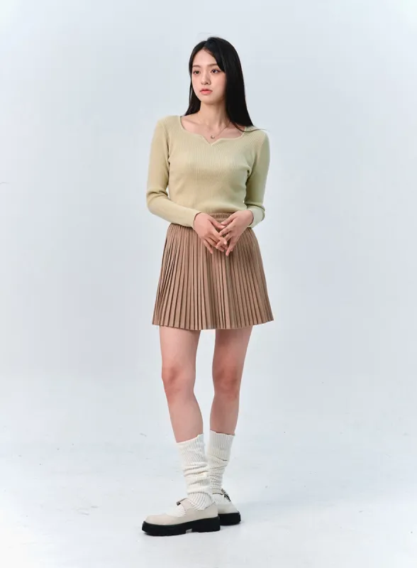 Solid Pleated Mini Skirt OO312 sold by Lewkin