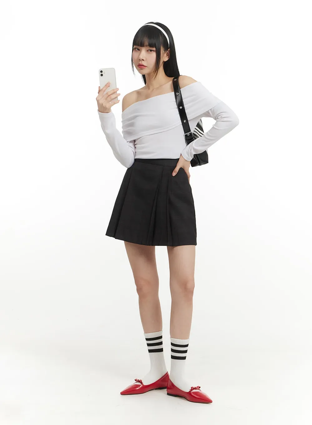 Pleated Checkered Mini Skirt IM406 sold by Lewkin