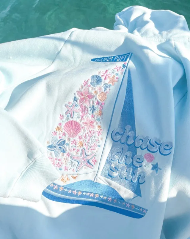 “Chase the Sun” Relaxed Hoodie in Sky Blue made by Pink Palm Puff