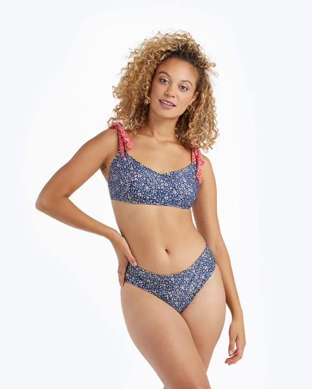 The Limited-Edition High Leg Mid Rise Bikini Bottom - In Bloom in Deep Sea sold by Summersalt