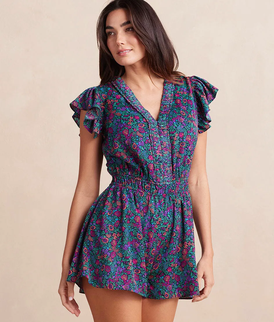 The Silky Luxe Ruffled Romper Cover-Up - Radiant Floral in Deep Sea sold by Summersalt