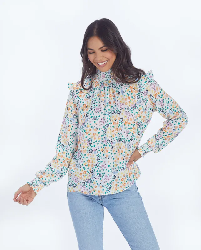 The Silky Mock Neck Blouse - Wildflower Fields in Sunshine & Coral sold by Summersalt