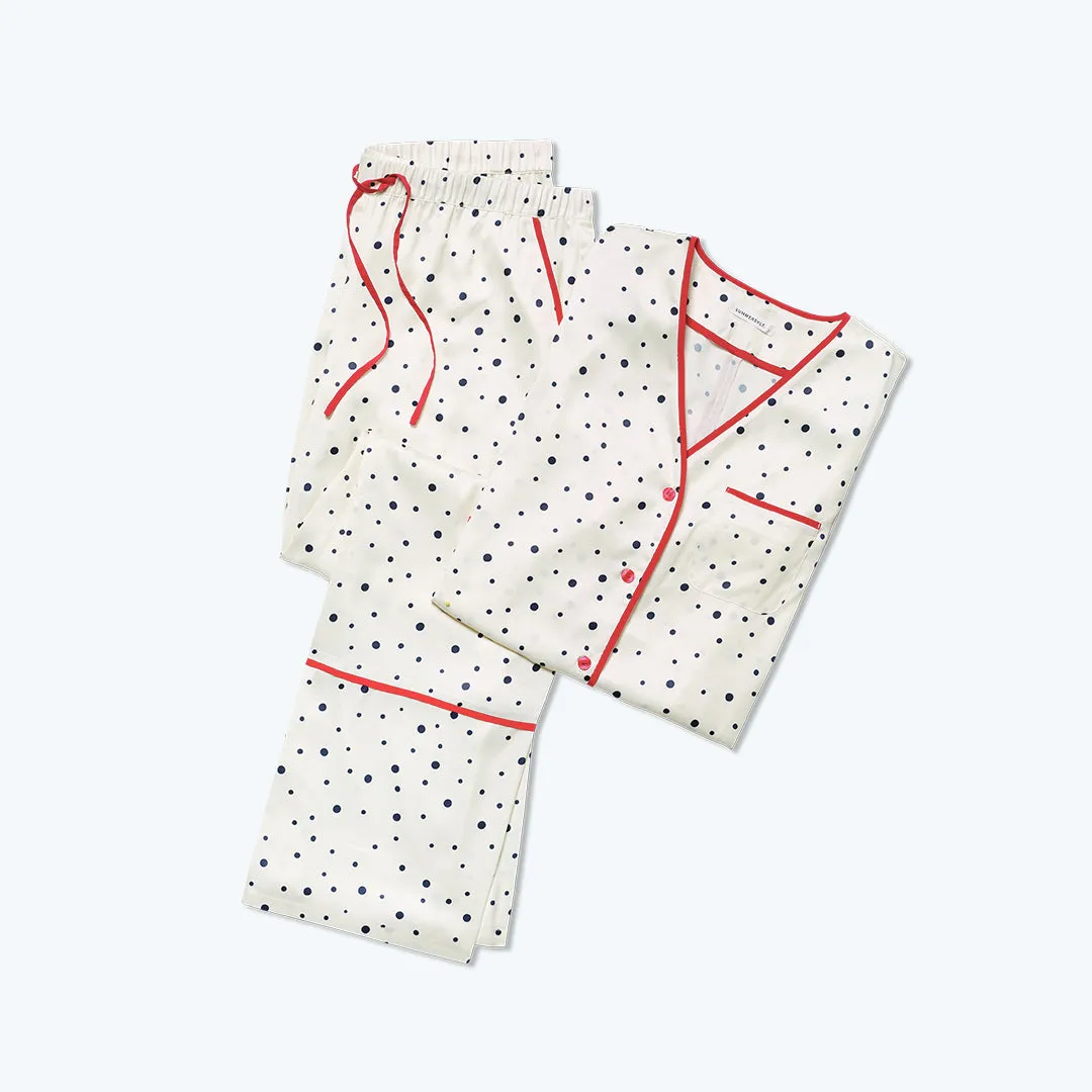 The Cloud 9 Silky Pajama Set - Celestial Dot in White Sand sold by Summersalt