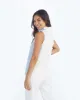 The High Neck Sweater Vest - Powder Blue & White Sand sold by Summersalt