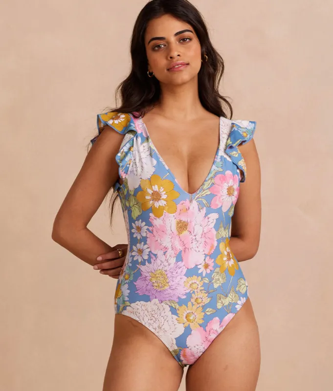 The Long Torso Ruffle Backflip - Country Club Floral sold by Summersalt