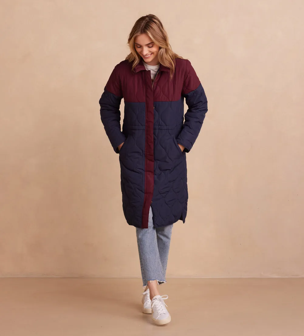 The Long Colorblock Eco Quilted Coat - Midnight & Black Cherry sold by Summersalt