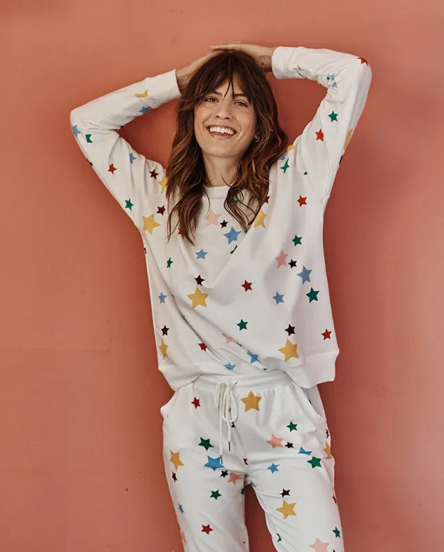 The Softest French Terry Relaxed Crew - Scatter Stars in White Sand sold by Summersalt