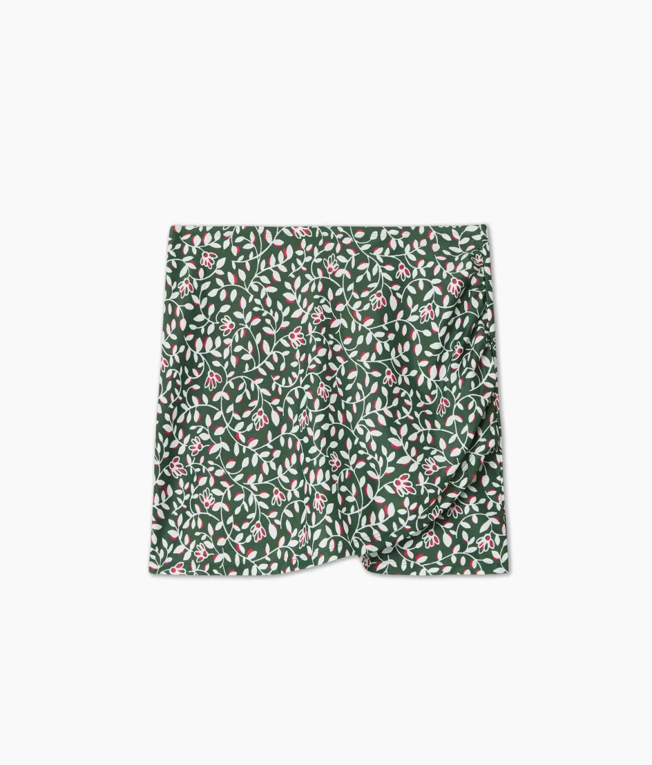 The Ruched Swim Skirt - Twilight Floral in Olive sold by Summersalt