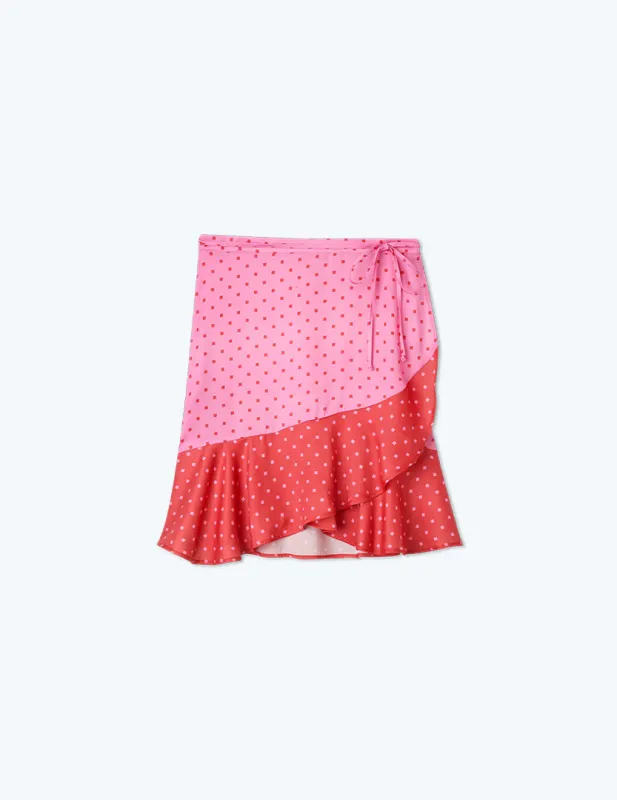 The Short Beach to Brunch Wrap Skirt - Square Dot in Flamingo & Hibiscus sold by Summersalt