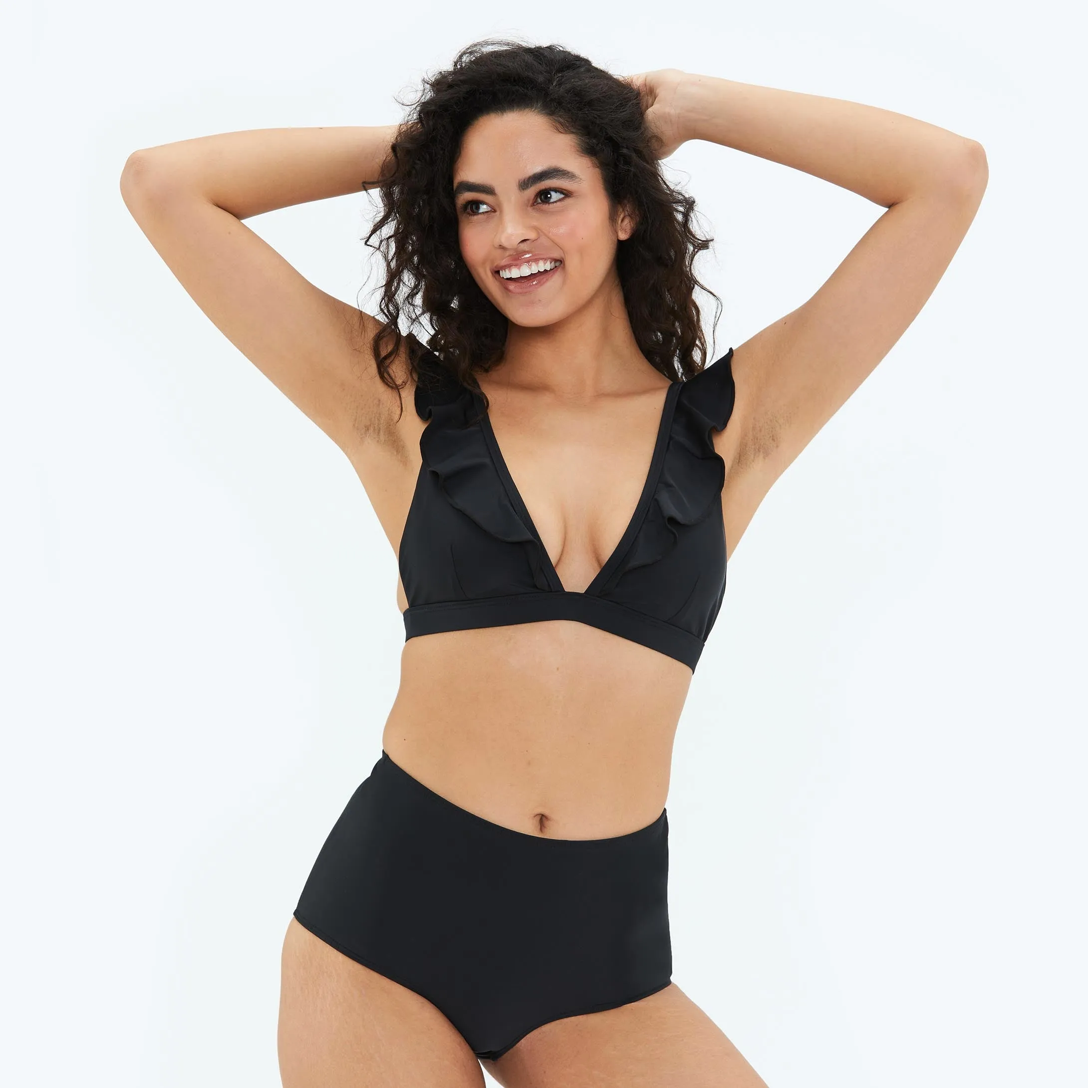 The Ruffle Plunge Bikini Top - Sea Urchin sold by Summersalt