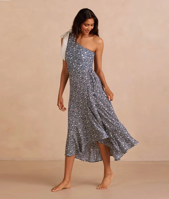 The Silky Luxe Beach to Brunch Wrap Skirt - Beach Botanical in Deep Sea sold by Summersalt