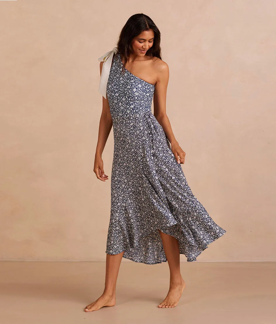 The Silky Luxe Beach to Brunch Wrap Skirt - Beach Botanical in Deep Sea sold by Summersalt