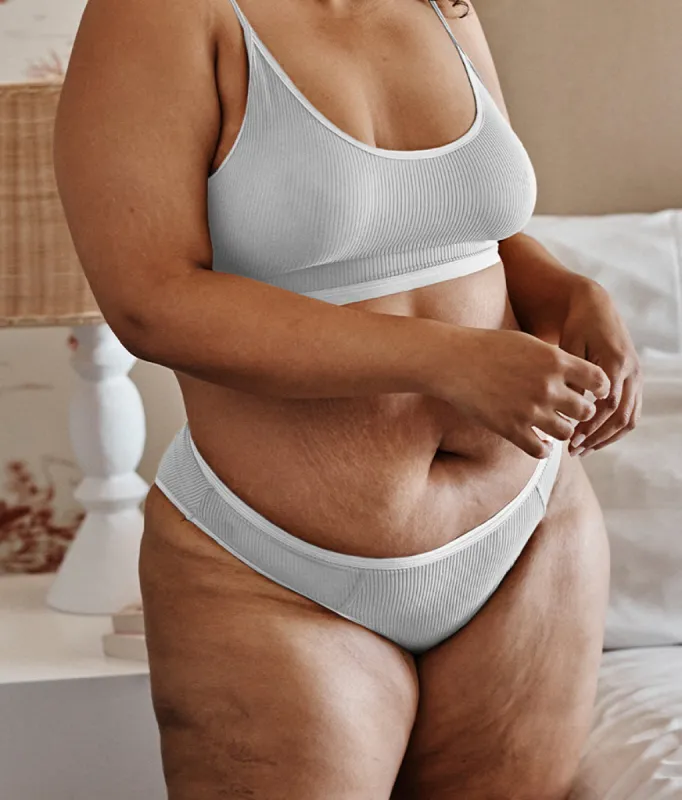 The Feel Free High Rise Brief Underwear - White Sand sold by Summersalt
