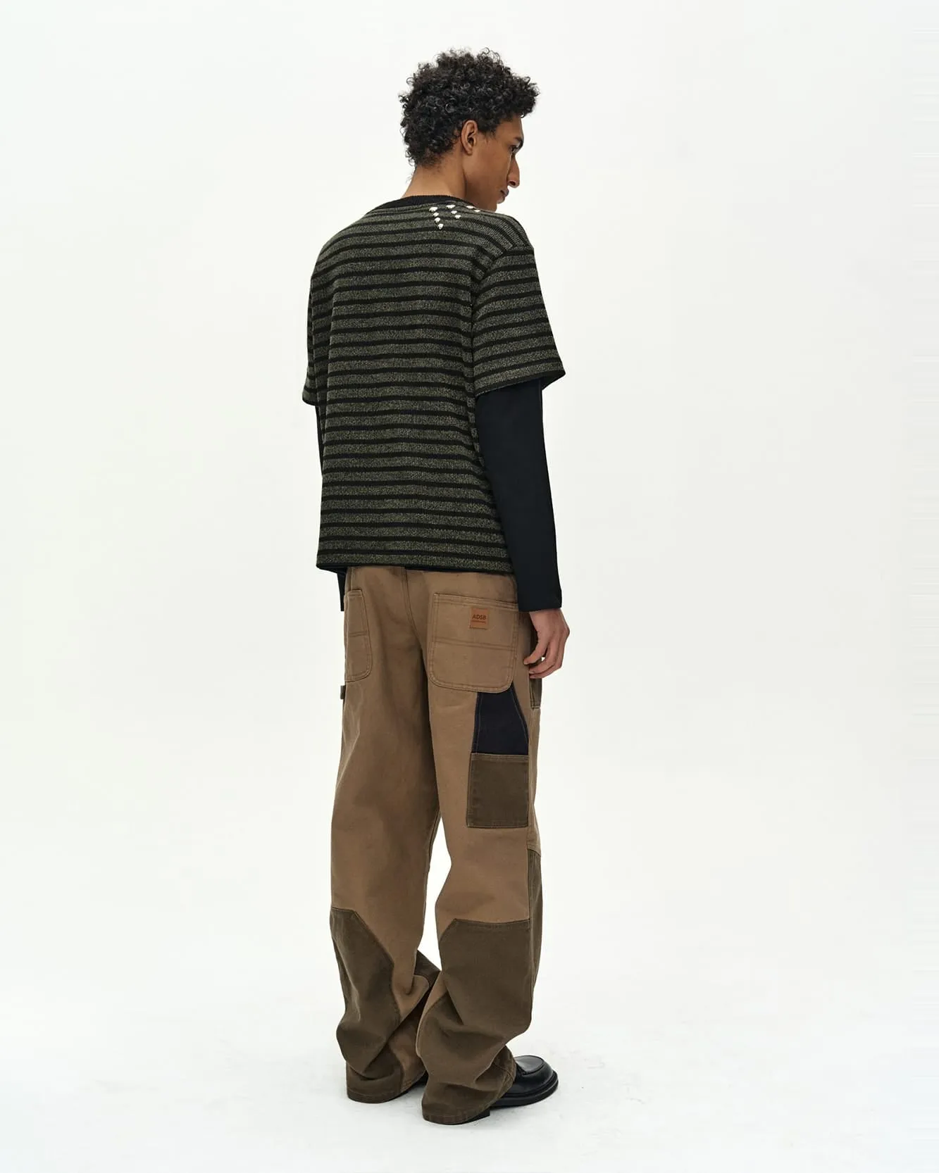UNISEX STUDDED STRIPE LAYERED SWEATER (BLACK) sold by Andersson Bell product image thumbnail 5