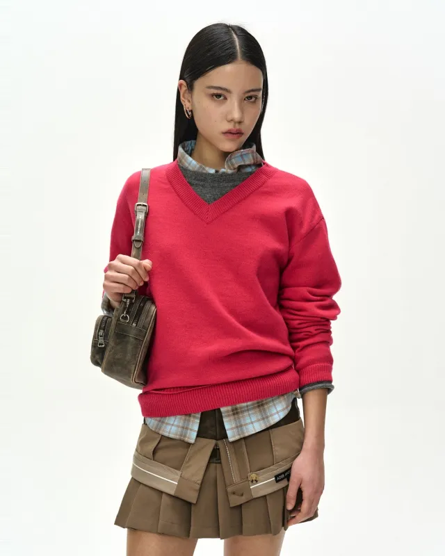 UNISEX LAYERED V-NECK SWEATER (MAGENTA) made by Andersson Bell