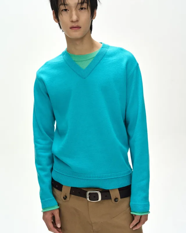 UNISEX LAYERED V-NECK SWEATER (SKY BLUE) made by Andersson Bell