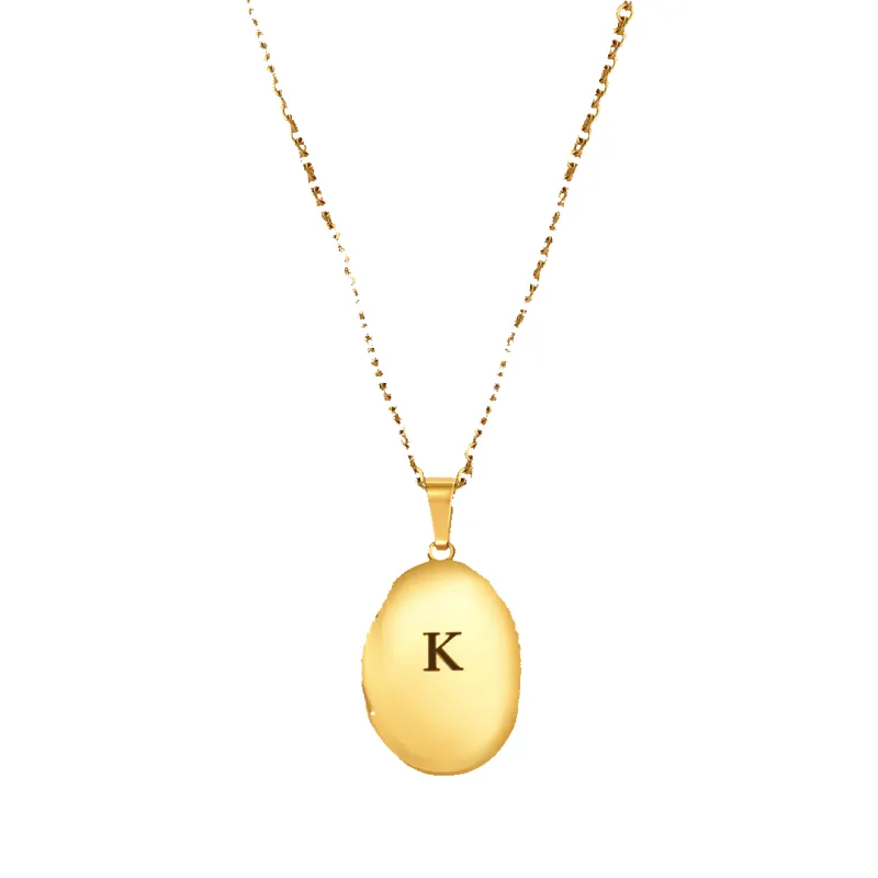 Engraved Oval Photo Locket Necklace sold by Mint & Lilly