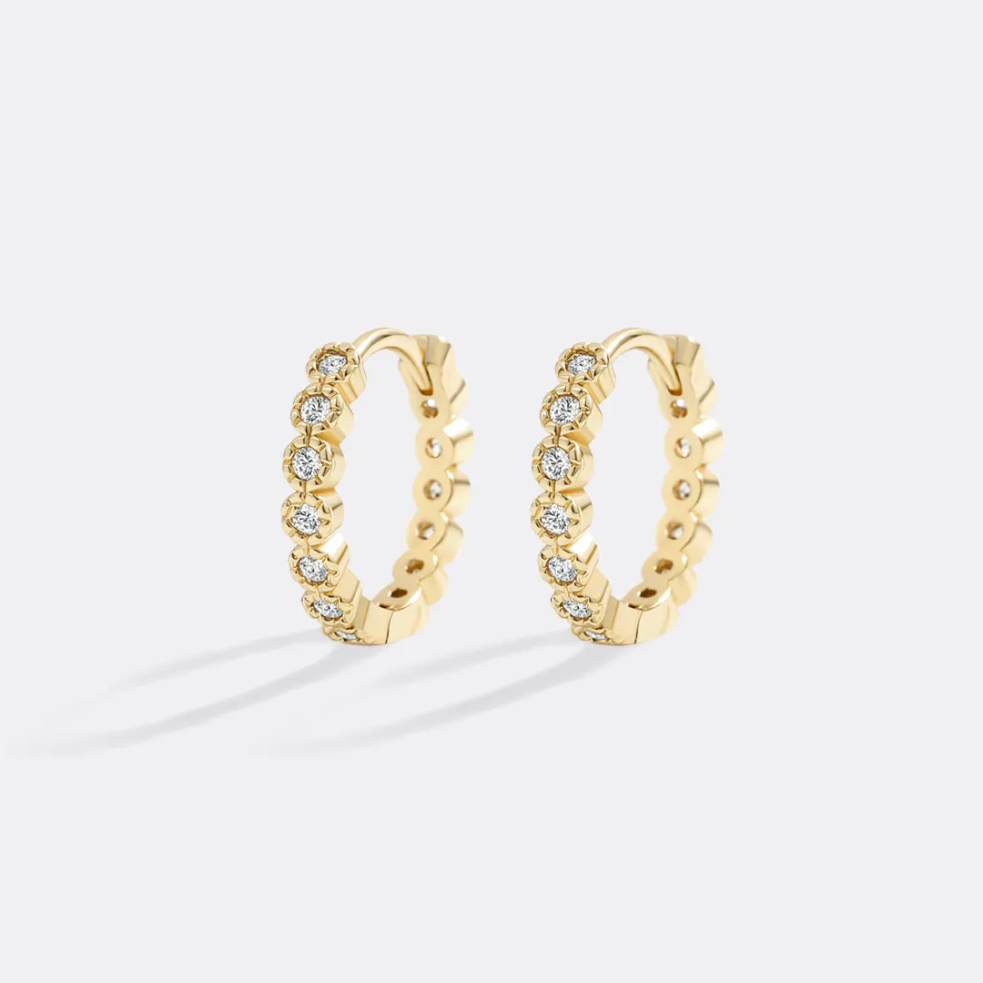 Shimmer Huggie Hoop Earrings sold by Mint & Lilly product image thumbnail 4