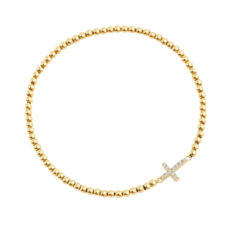 Gold Beaded Cross Stretch Bracelet sold by Mint & Lilly
