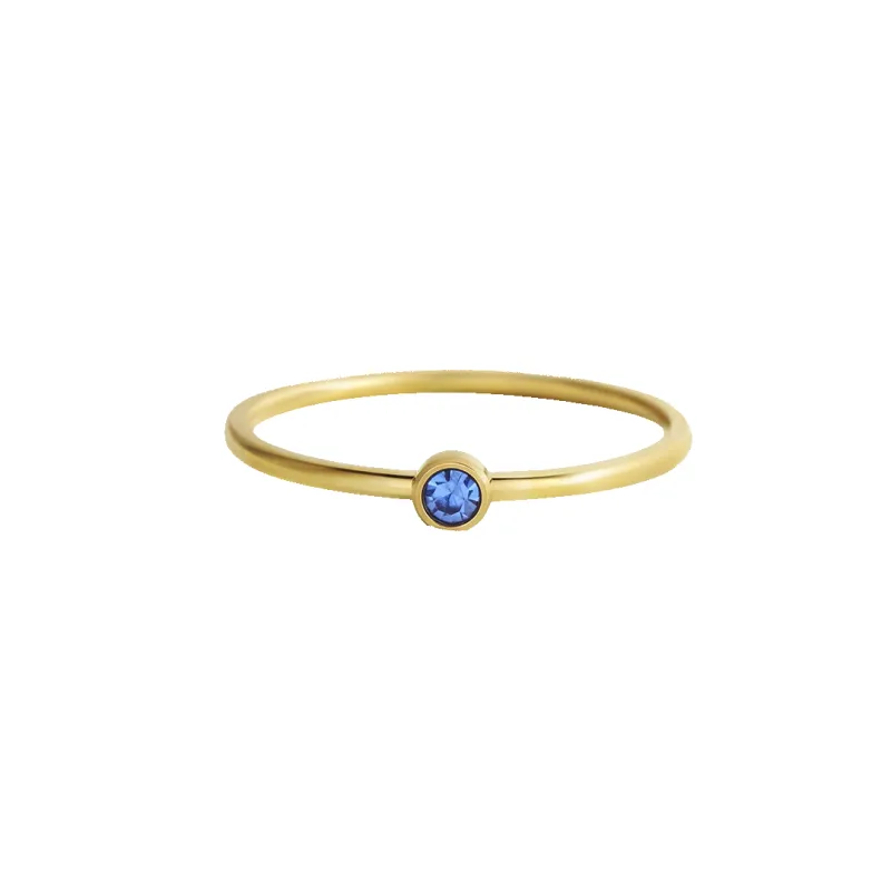 Minimalist Bezel-Set December Birthstone Stacking Band sold by Mint & Lilly