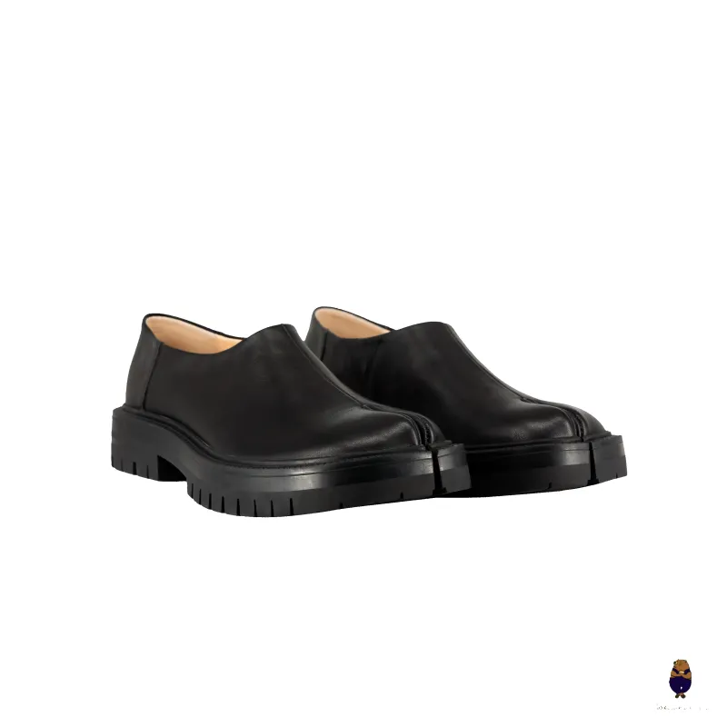 WoodchuckSato Black Leather Tabi Slip-On Lug Sole Loafers sold by WoodChuckSato
