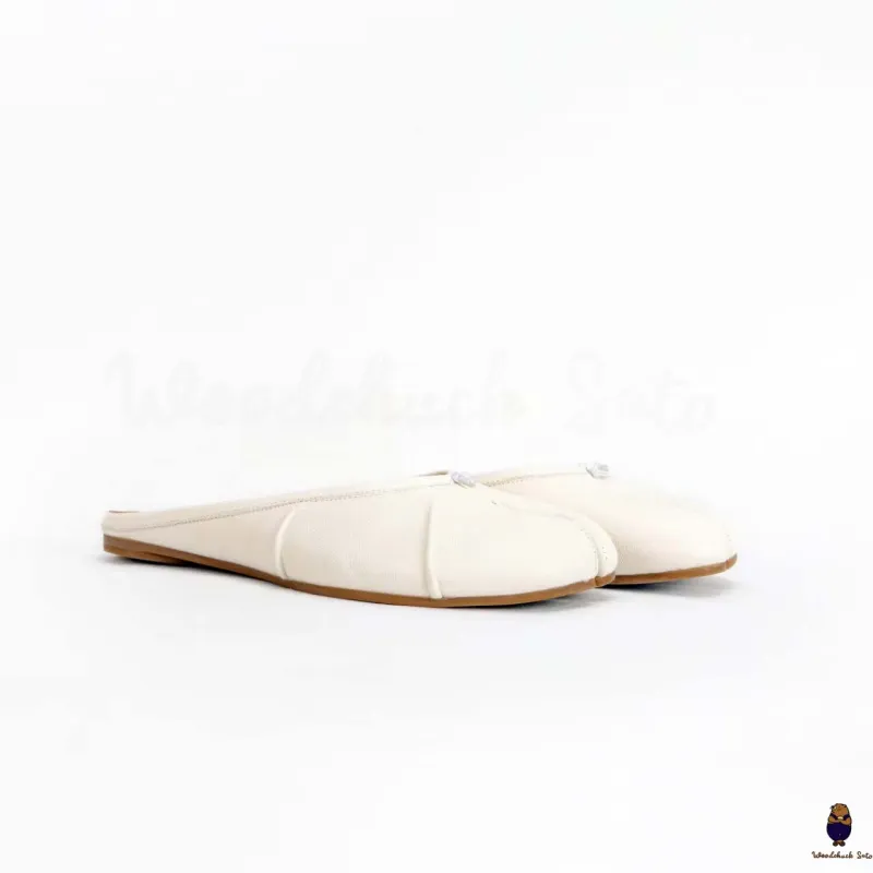 WoodchuckSato White Fold Leather Tabi Slip-On Mules sold by WoodChuckSato