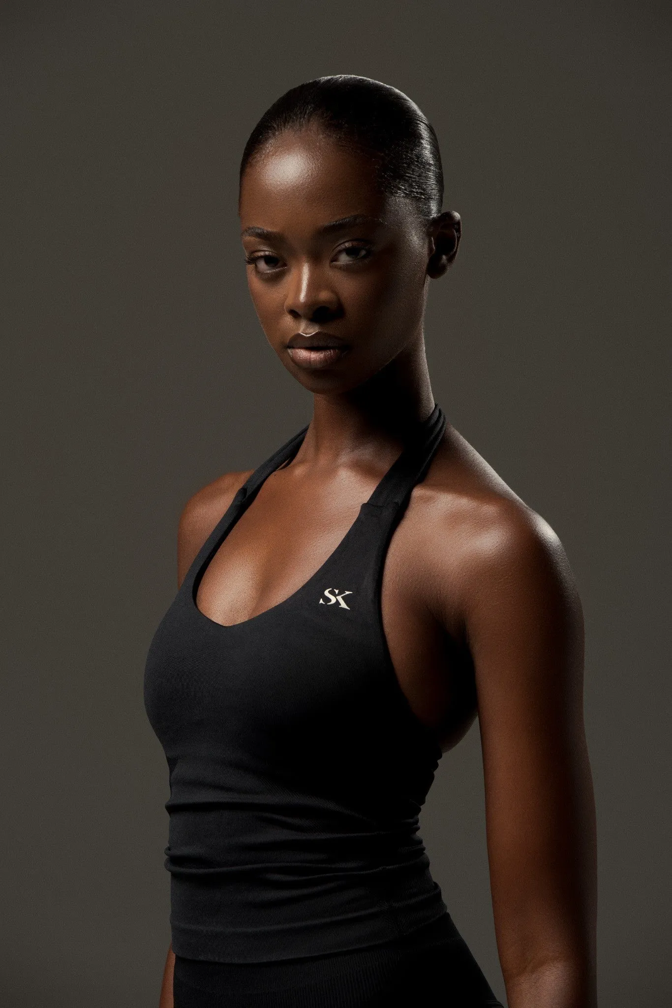 SK Skulpt Halter Tank Black sold by SK KINETIX
