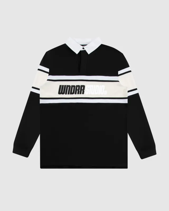 STUDIO PANEL RUGBY POLO - FADED BLACK sold by WNDRR
