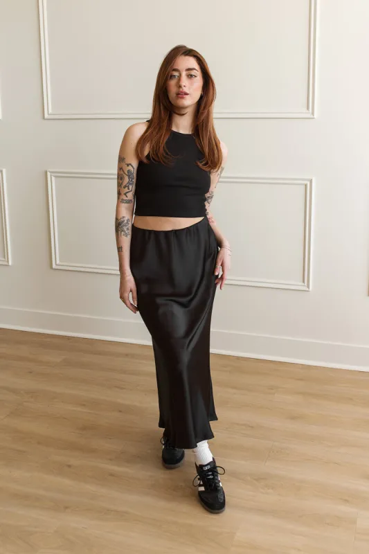 Ellye Black | Long Stretchable Skirt sold by Boutique 1861