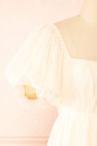 Faye | Beige Babydoll Dress sold by Boutique 1861