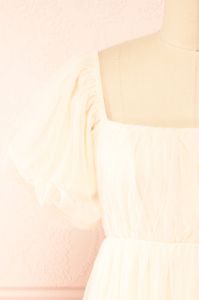 Faye | Beige Babydoll Dress sold by Boutique 1861