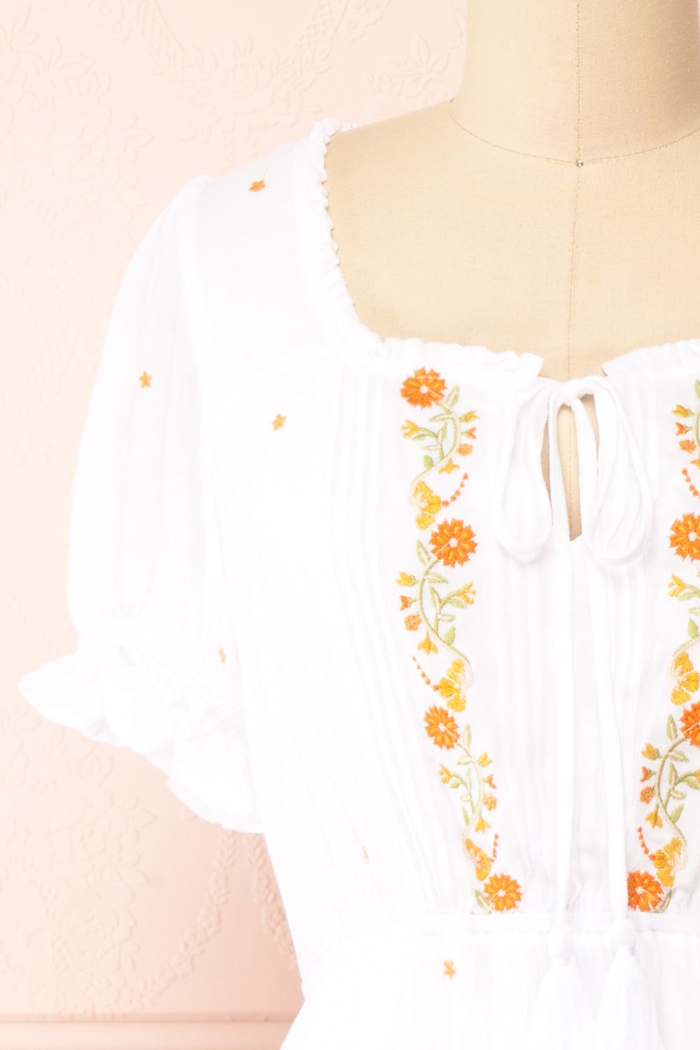 Elden | White Peplum Top w/ Floral Embroidery sold by Boutique 1861 product image thumbnail 2