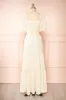 Zeinab | Yellow Floral Midi Dress sold by Boutique 1861