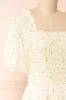 Zeinab | Yellow Floral Midi Dress sold by Boutique 1861