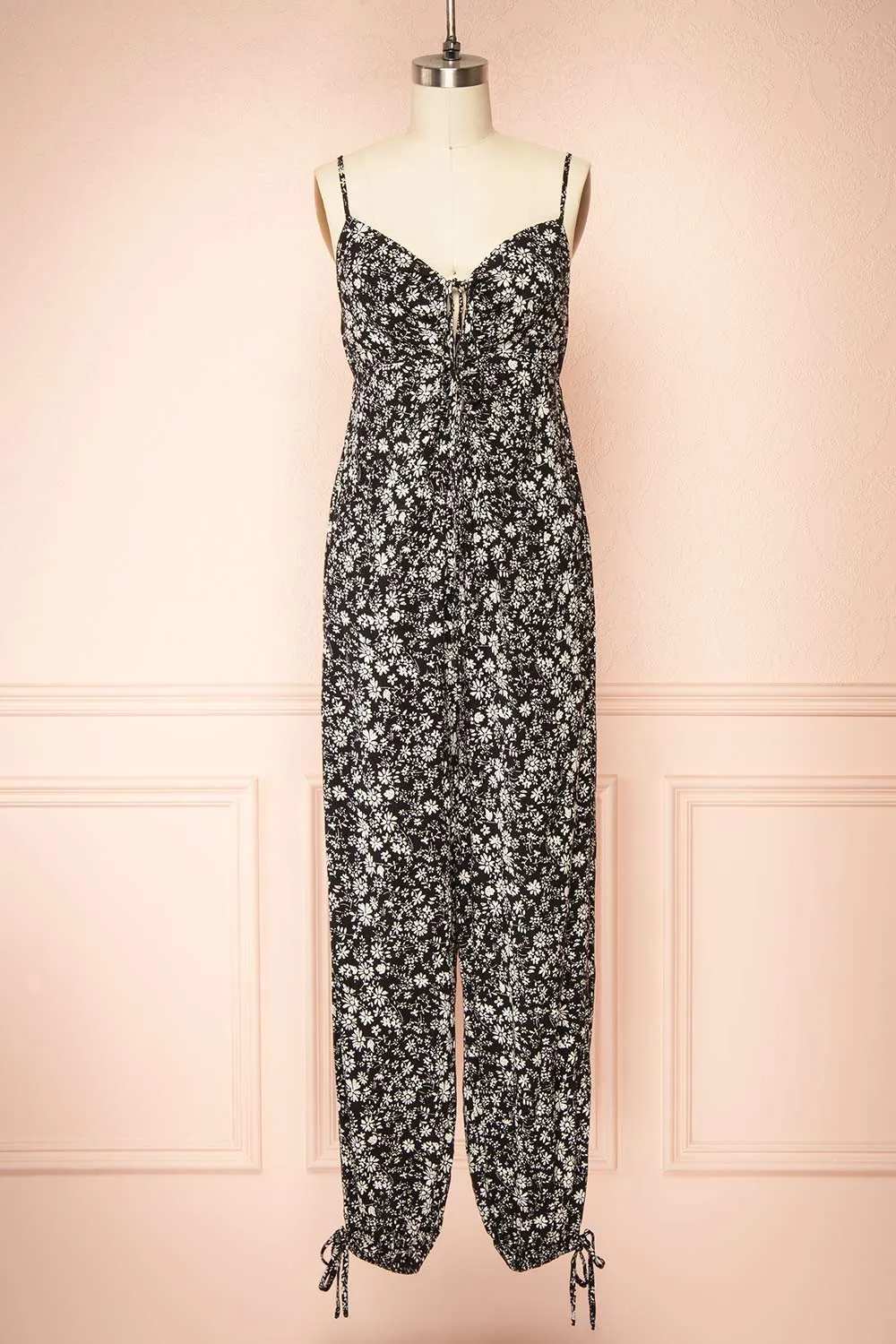 Hecate | Black Jumpsuit w/ White Floral Motif sold by Boutique 1861