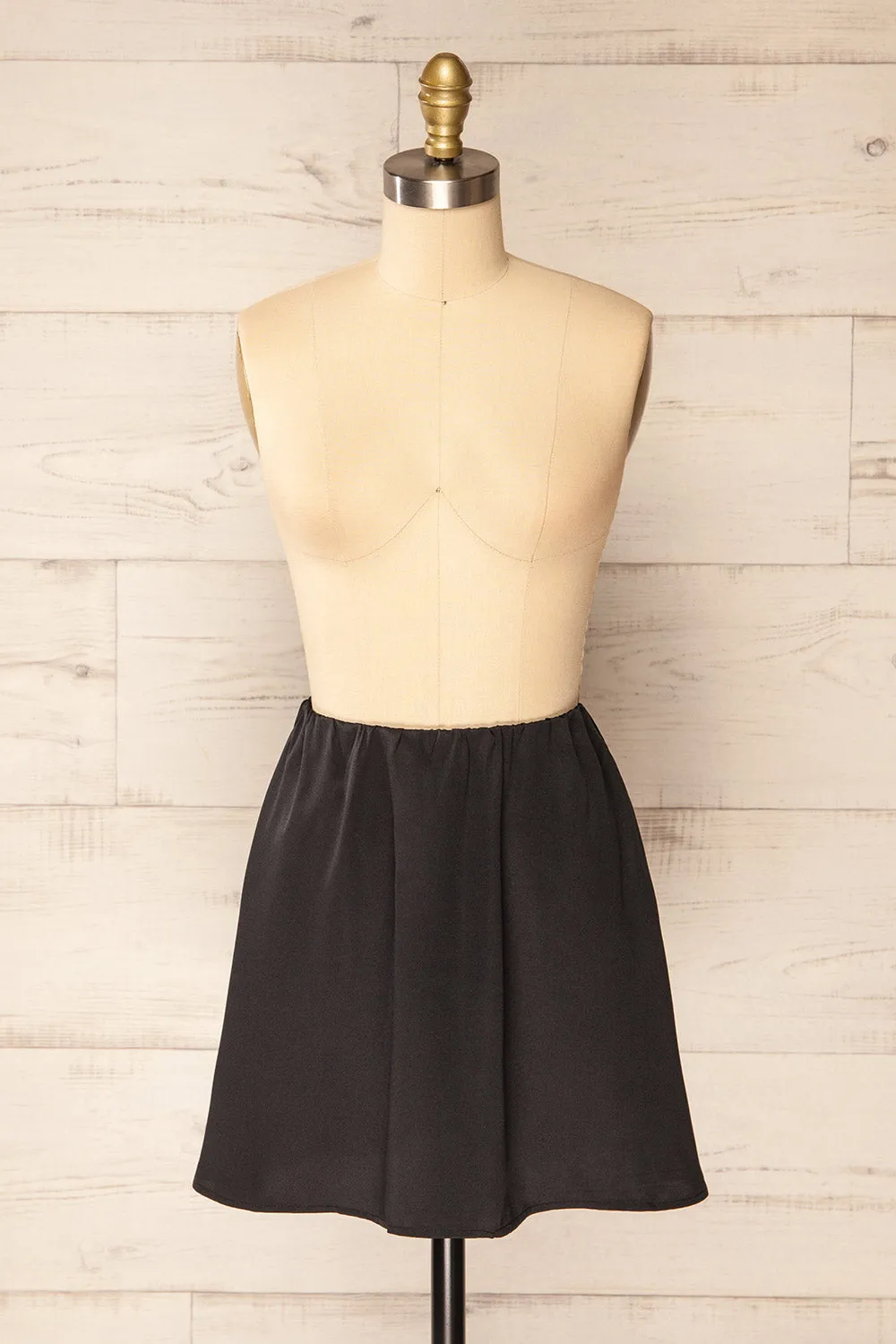Tourcoing | Short Black Skirt w/ Elastic Waist sold by Boutique 1861
